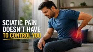 Man experiencing sciatic nerve pain in the lower back while sitting